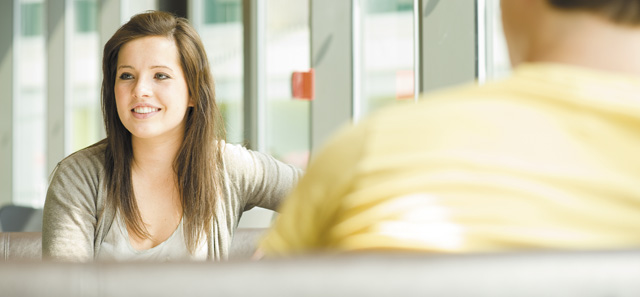 Student smiling in the student cafe